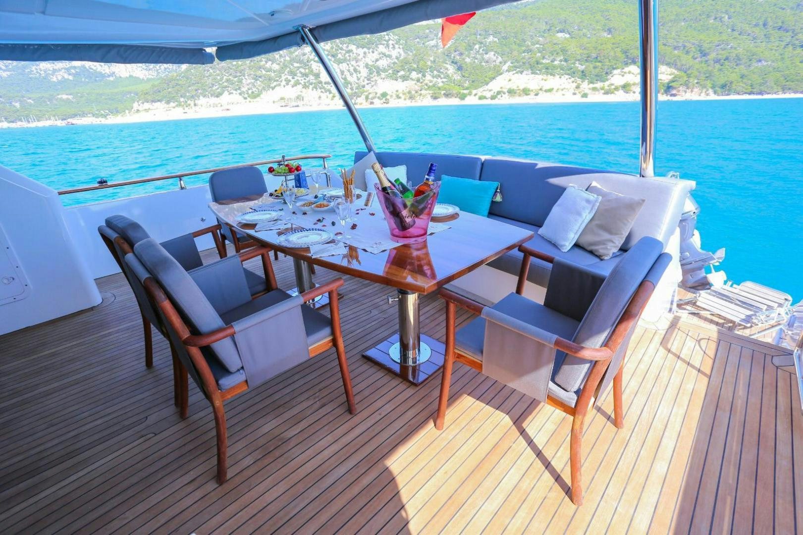 a table and chairs on a deck aboard NO NAME Yacht for Sale