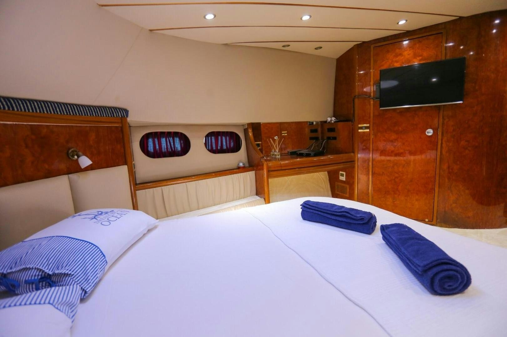 a bed with white sheets and pillows aboard NO NAME Yacht for Sale