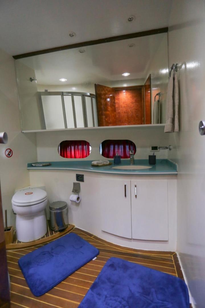 a bathroom with a toilet and a sink aboard NO NAME Yacht for Sale