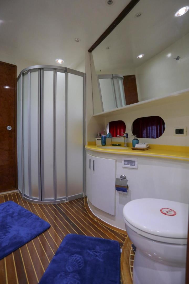a bathroom with a shower and toilet aboard NO NAME Yacht for Sale