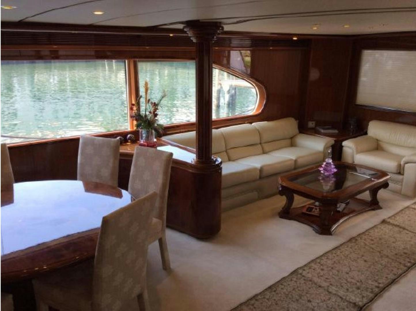 a room with a table and chairs aboard NO NAME Yacht for Sale