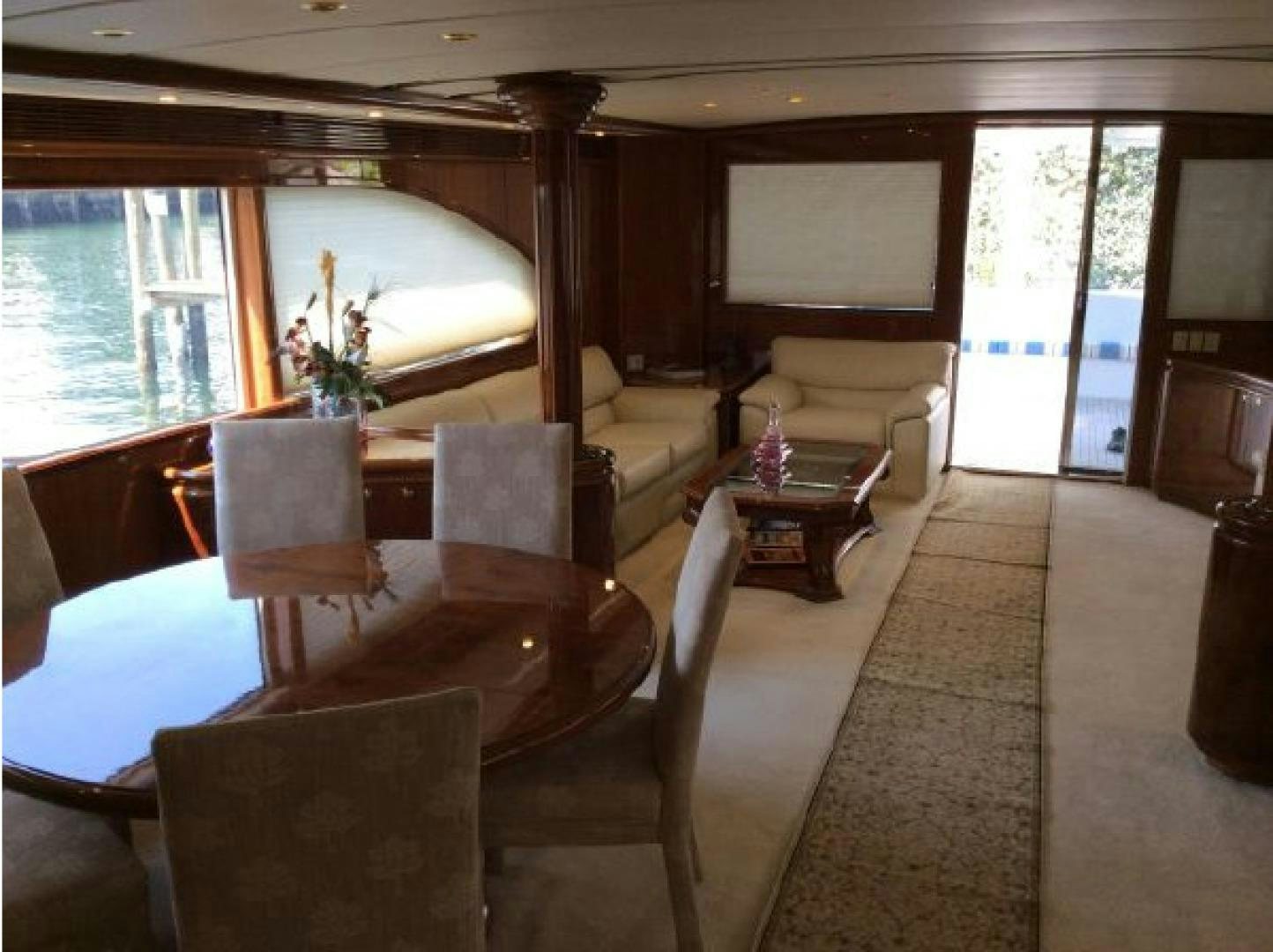 a living room with a large window aboard NO NAME Yacht for Sale