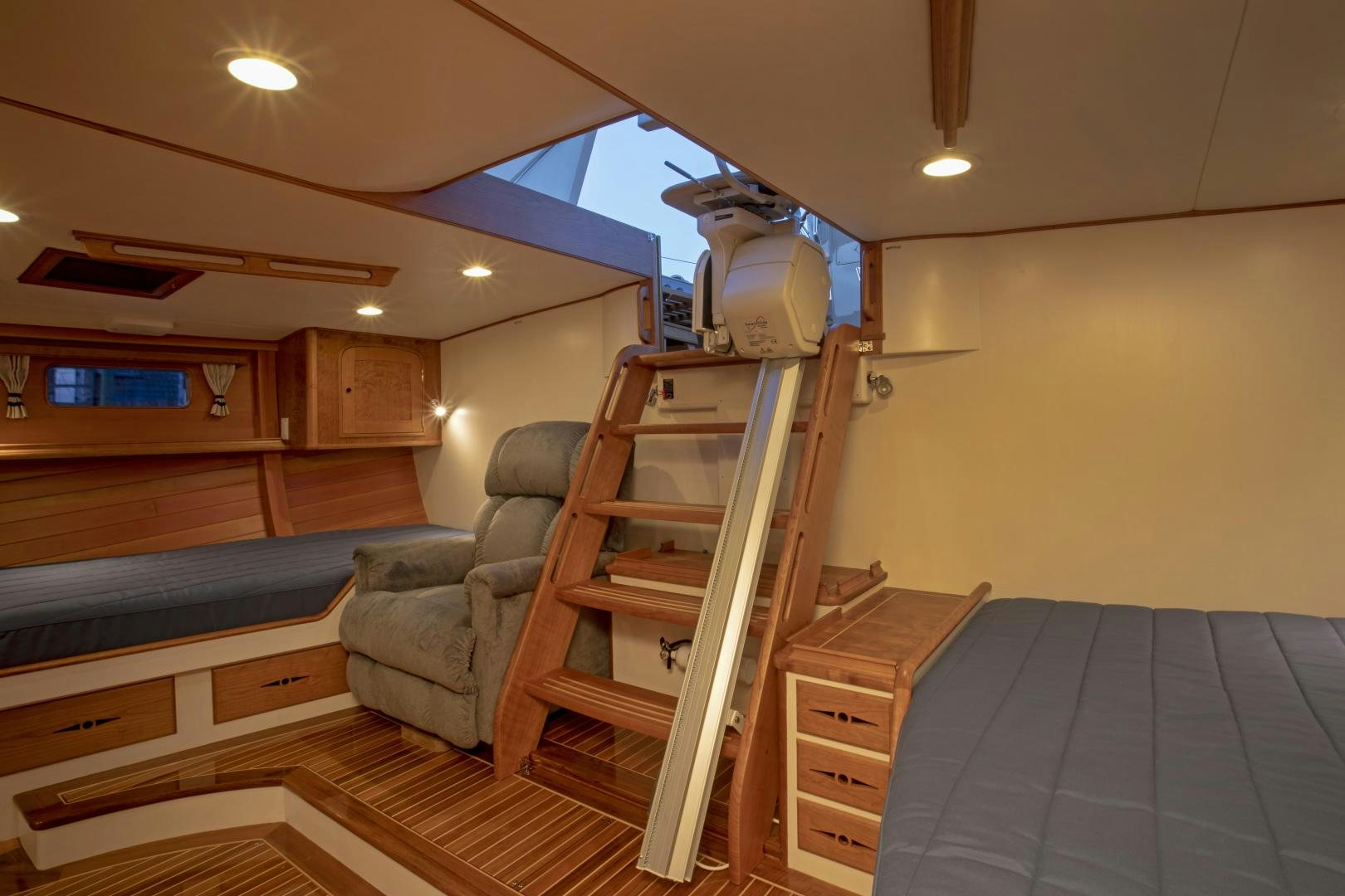 a room with a bed and a couch aboard SONNY III Yacht for Sale