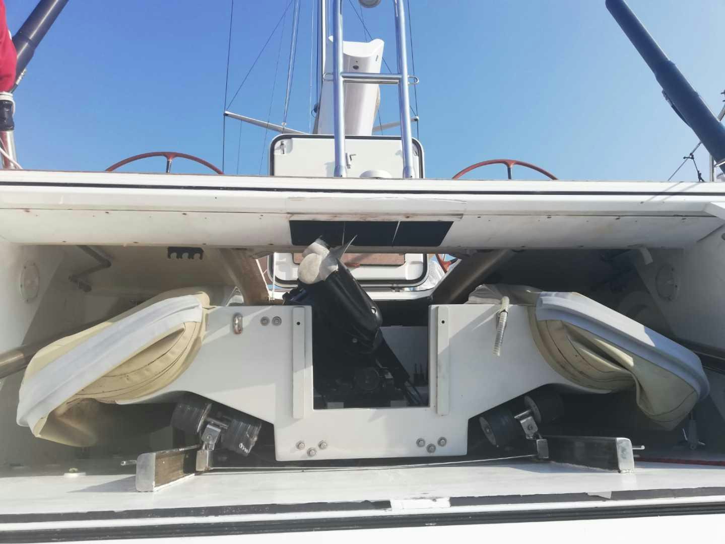 a white boat with a metal frame aboard B5 Yacht for Sale