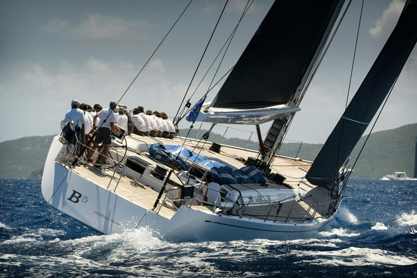 a group of people on a sailboat aboard B5 Yacht for Sale