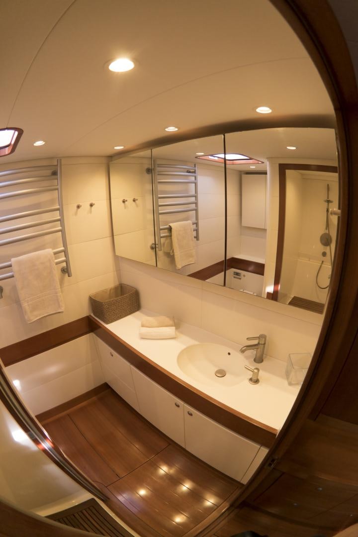 a bathroom with a sink and a mirror aboard B5 Yacht for Sale