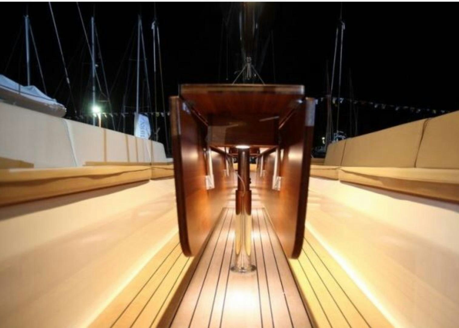 a wooden chair in a room aboard B5 Yacht for Sale