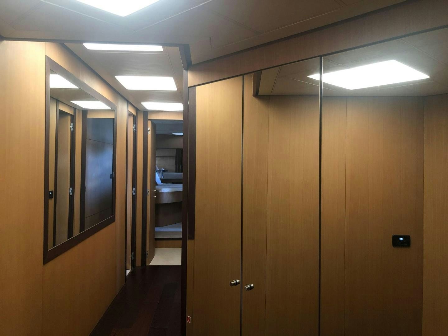 a room with doors and windows aboard YCM 90 Yacht for Sale