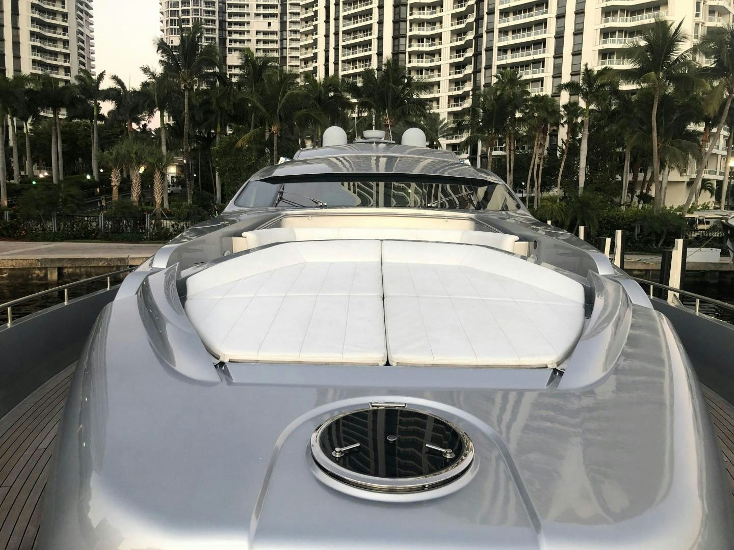 a white car with a round roof aboard YCM 90 Yacht for Sale