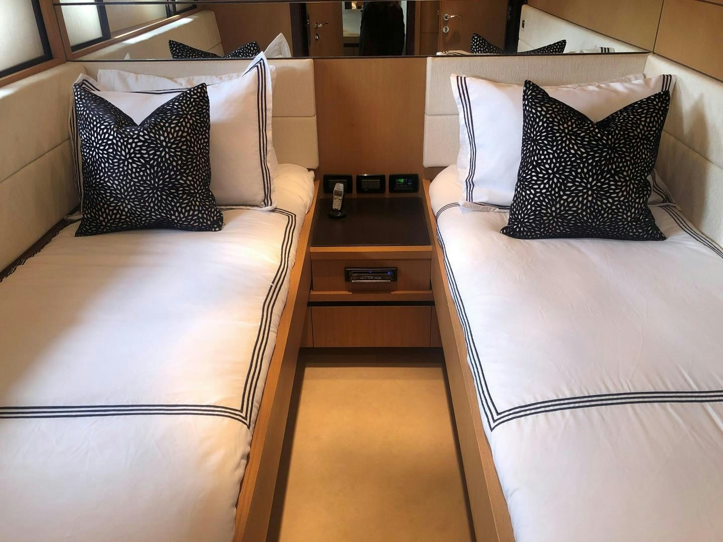 a hotel room with a bed and a desk aboard YCM 90 Yacht for Sale