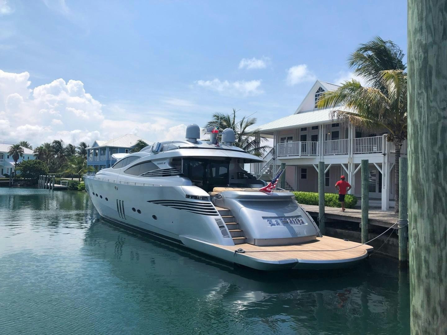 a boat docked at a pier aboard YCM 90 Yacht for Sale