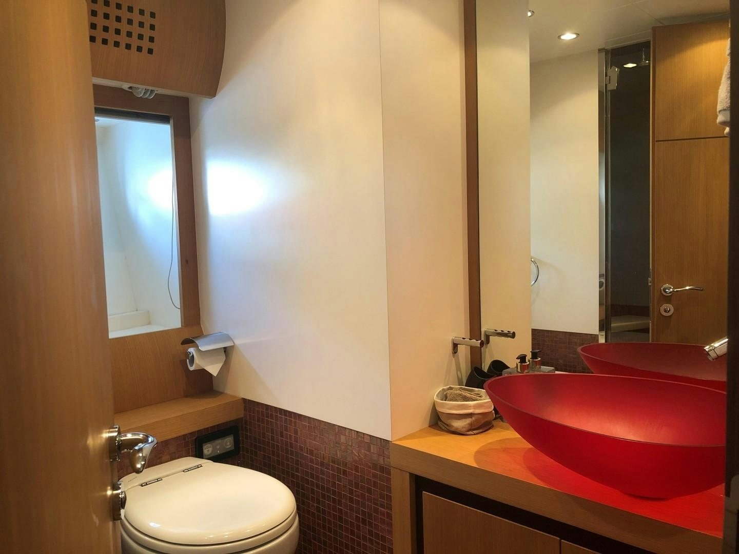 a bathroom with a sink and a toilet aboard YCM 90 Yacht for Sale