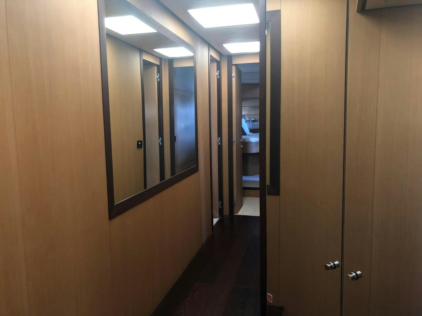 a hallway with doors aboard YCM 90 Yacht for Sale