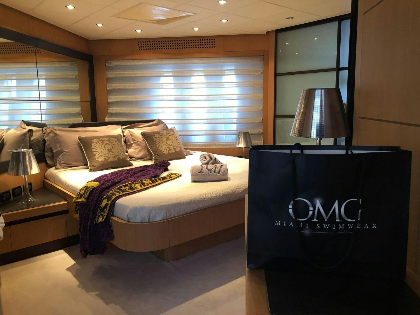 a hotel room with a bed aboard YCM 90 Yacht for Sale