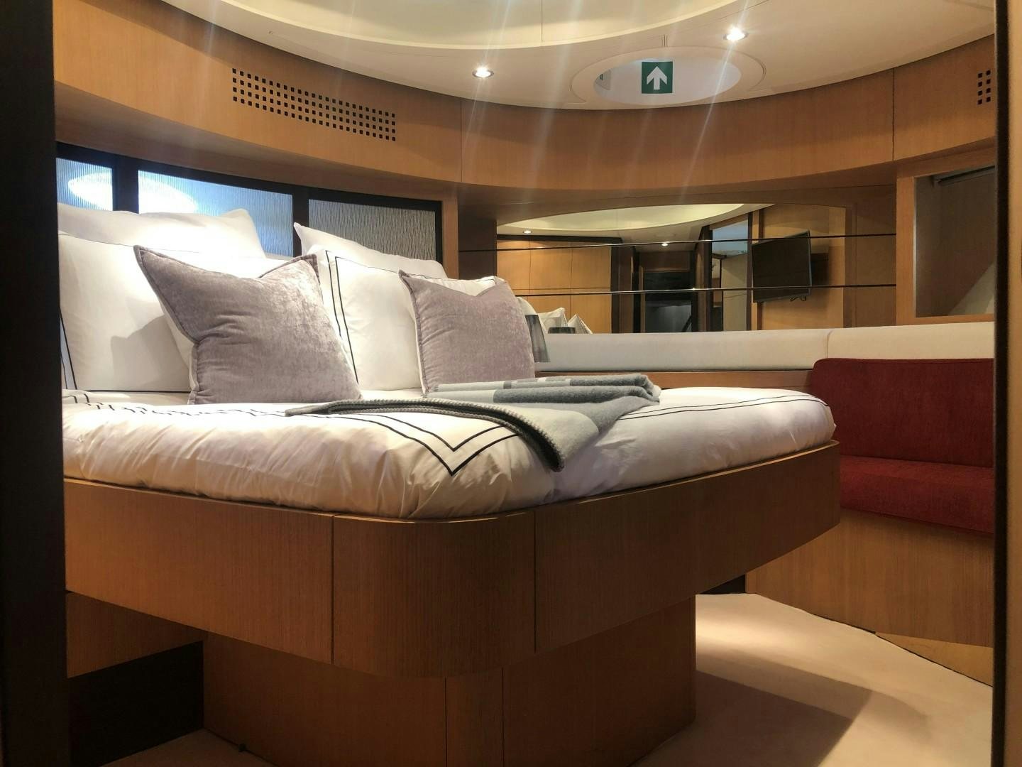 a bed in a room aboard YCM 90 Yacht for Sale