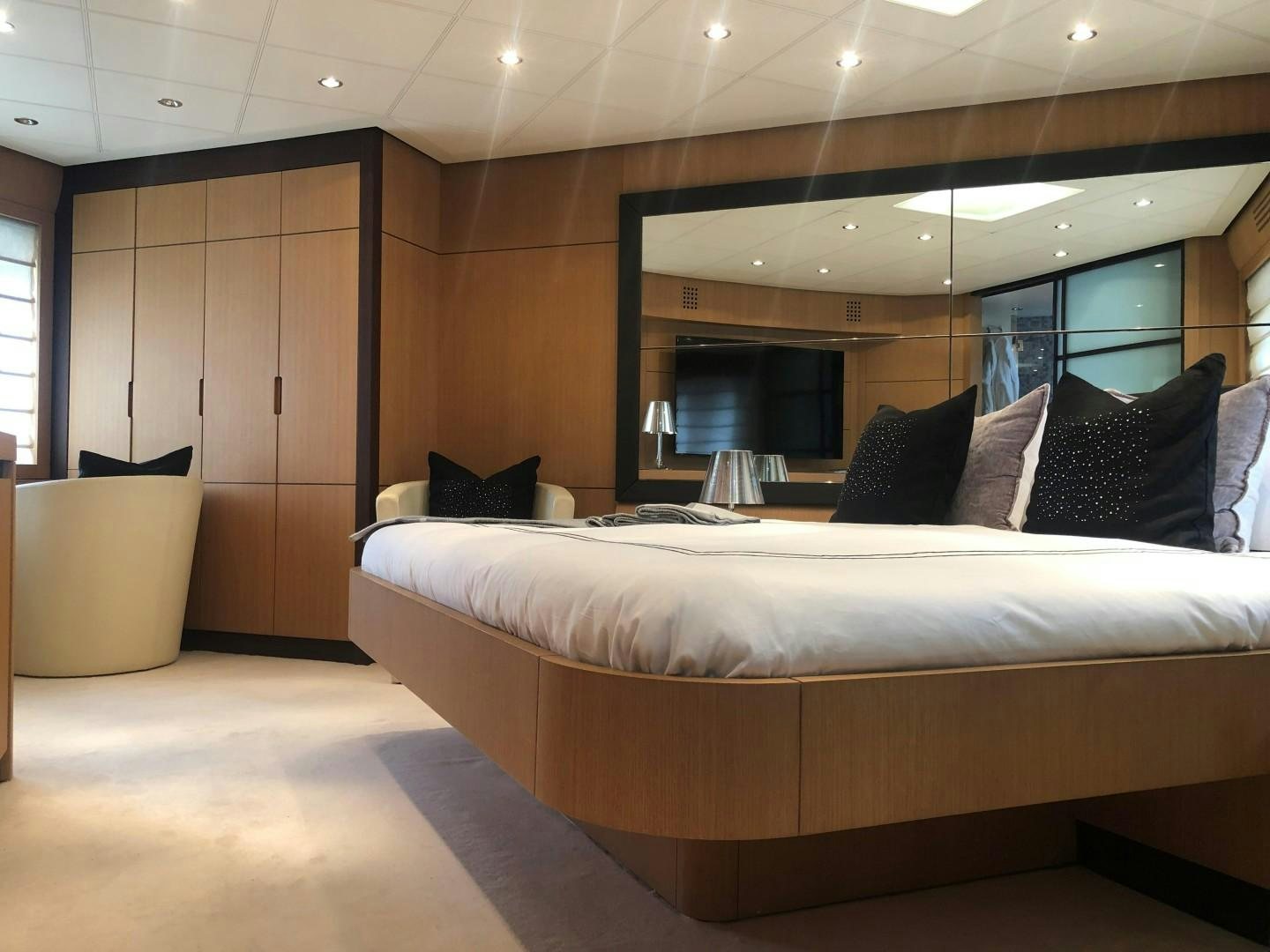a bed in a room aboard YCM 90 Yacht for Sale