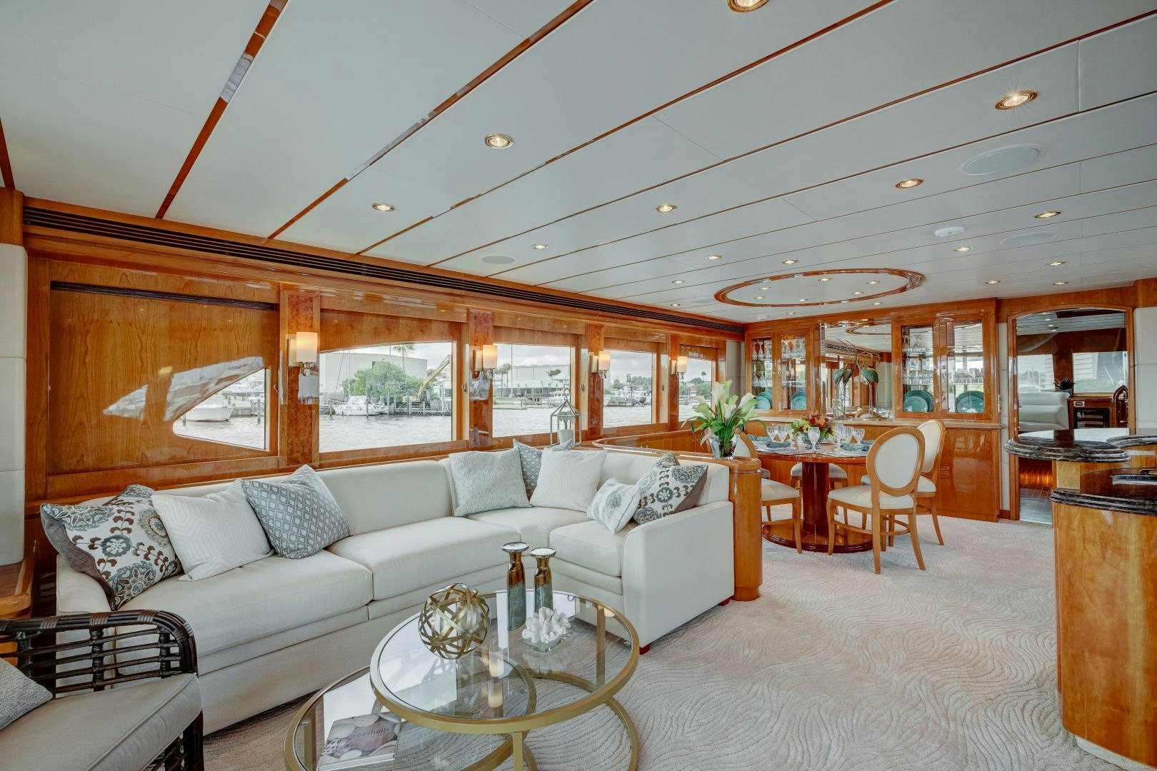 a living room with a large window aboard TEE TIME Yacht for Sale