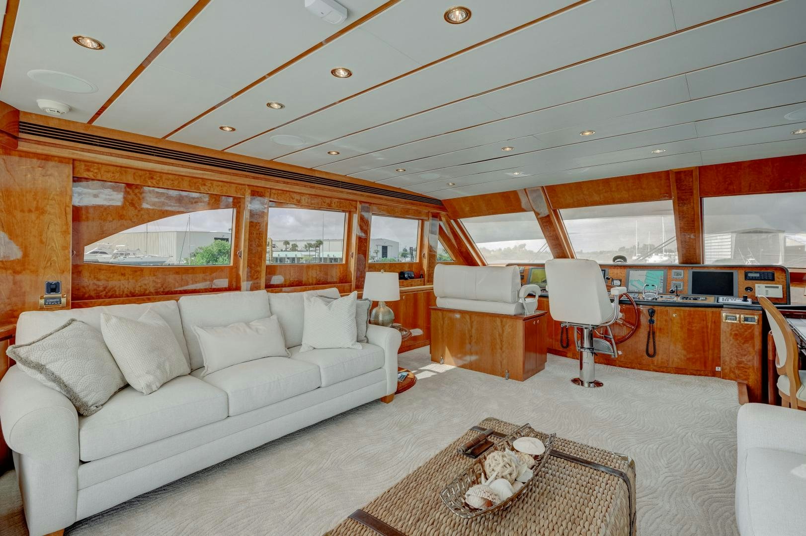 a living room with a large window aboard TEE TIME Yacht for Sale