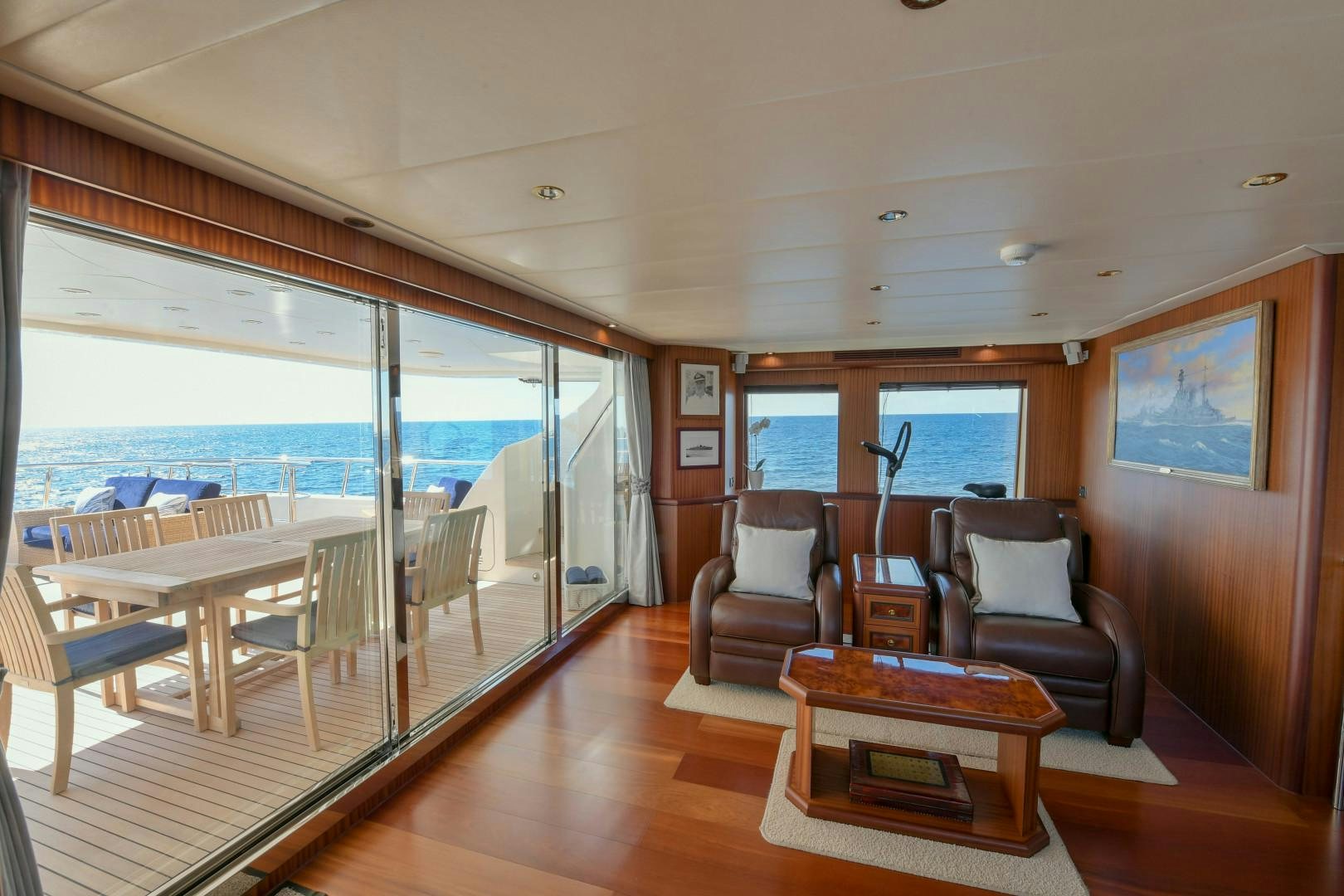 a living room with a large window aboard LITTLE BLUE Yacht for Sale