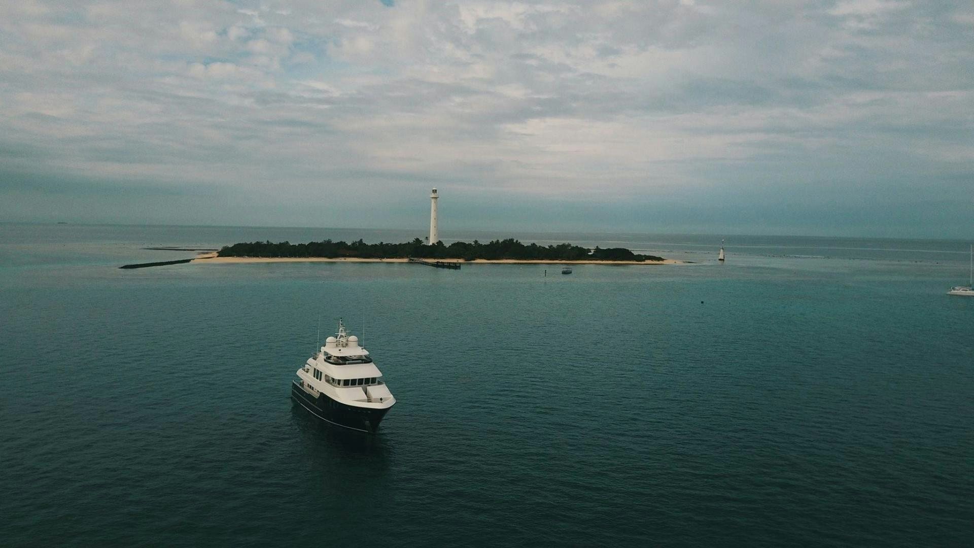 a boat sailing on the sea aboard LITTLE BLUE Yacht for Sale