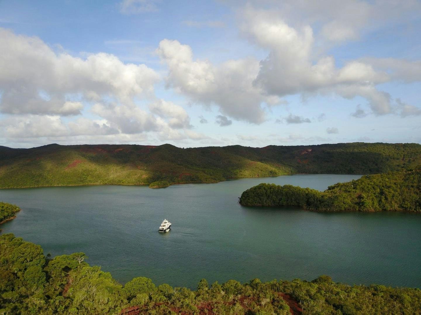 a boat in the water aboard LITTLE BLUE Yacht for Sale