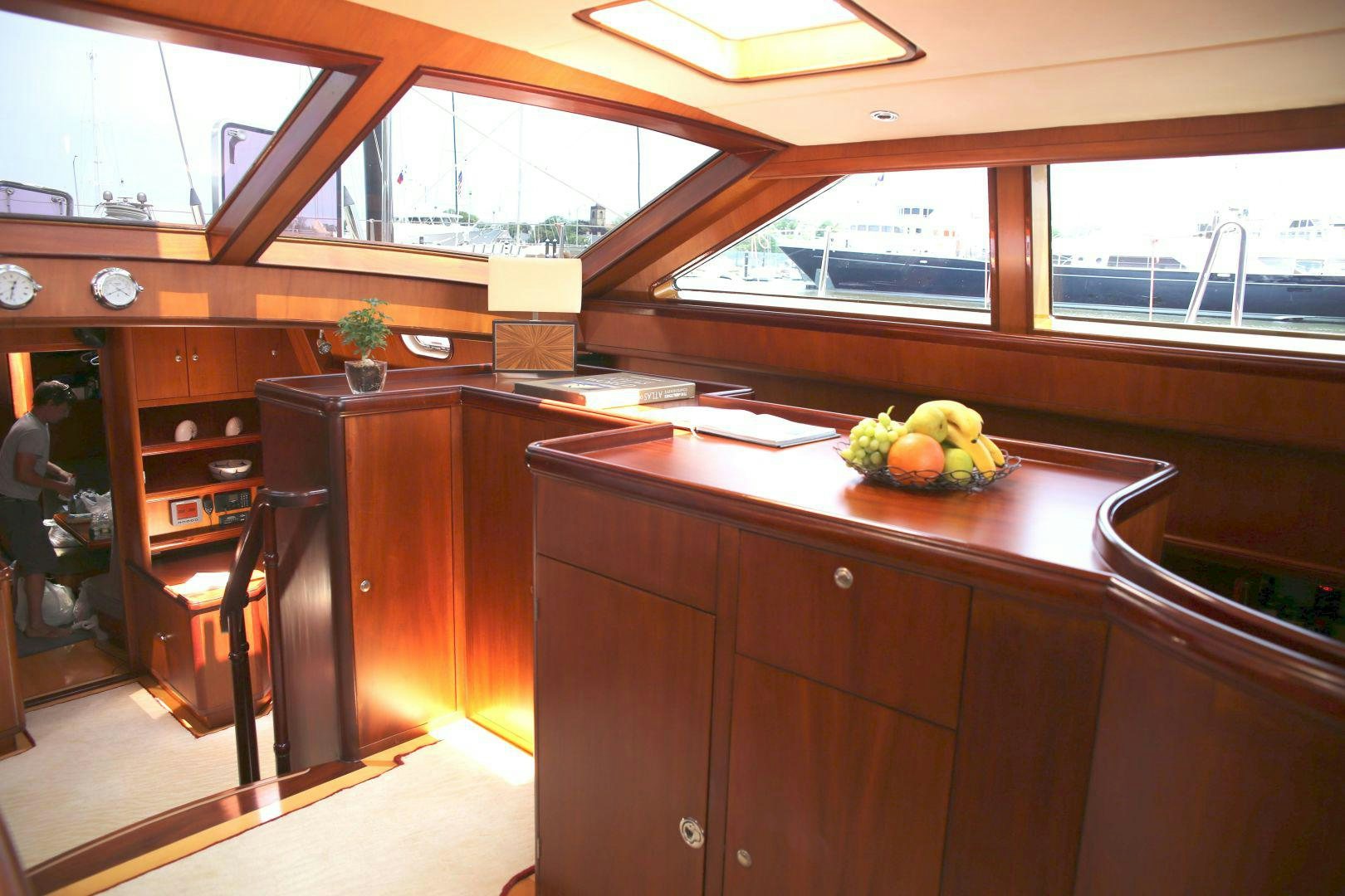 a kitchen with a counter and cabinets aboard WHIRLWIND Yacht for Sale