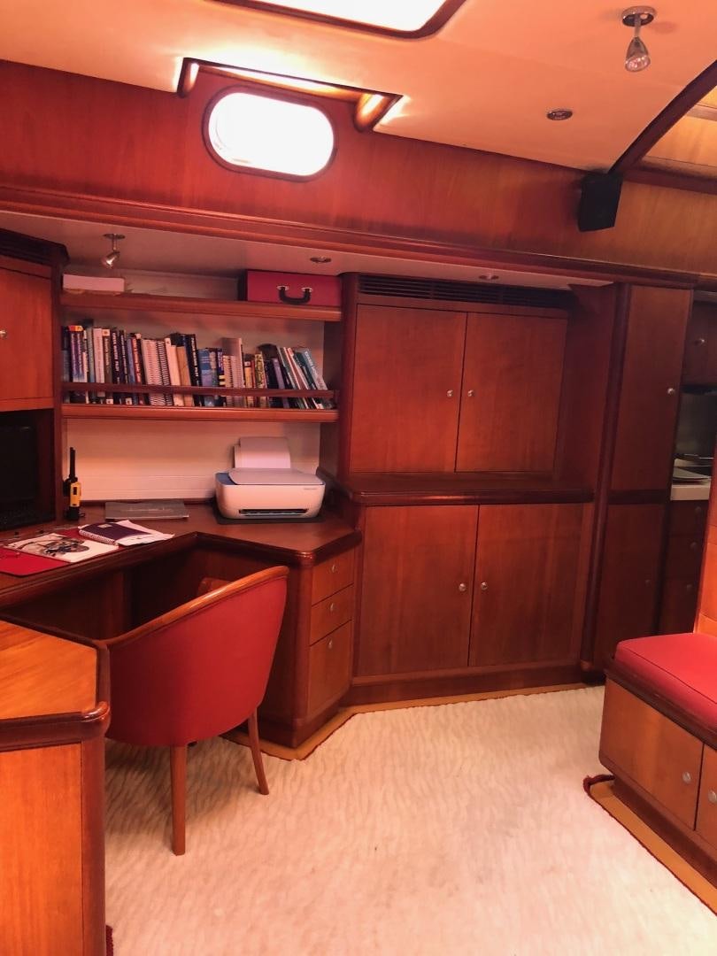 a room with a desk and a chair aboard WHIRLWIND Yacht for Sale