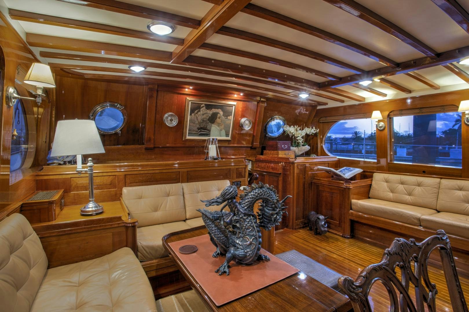 a living room with a large window aboard SEA DIAMOND Yacht for Sale