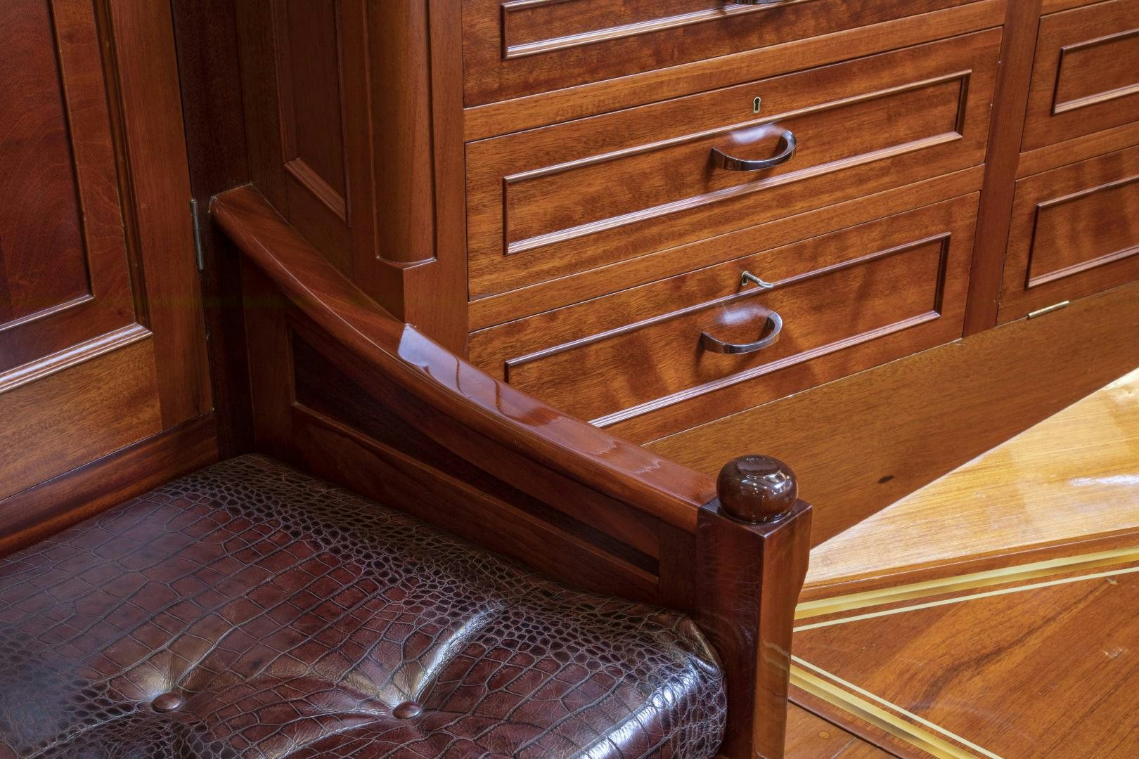 a wooden dresser with drawers aboard SEA DIAMOND Yacht for Sale