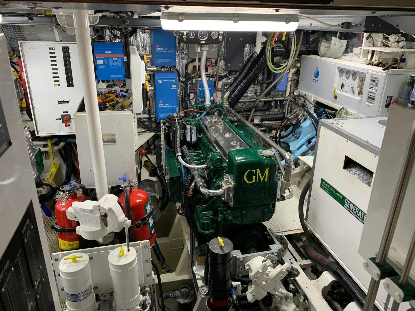 a large machine with a green and red engine aboard SEA DIAMOND Yacht for Sale