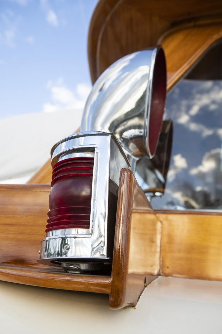 a close-up of a car's side mirror aboard SEA DIAMOND Yacht for Sale