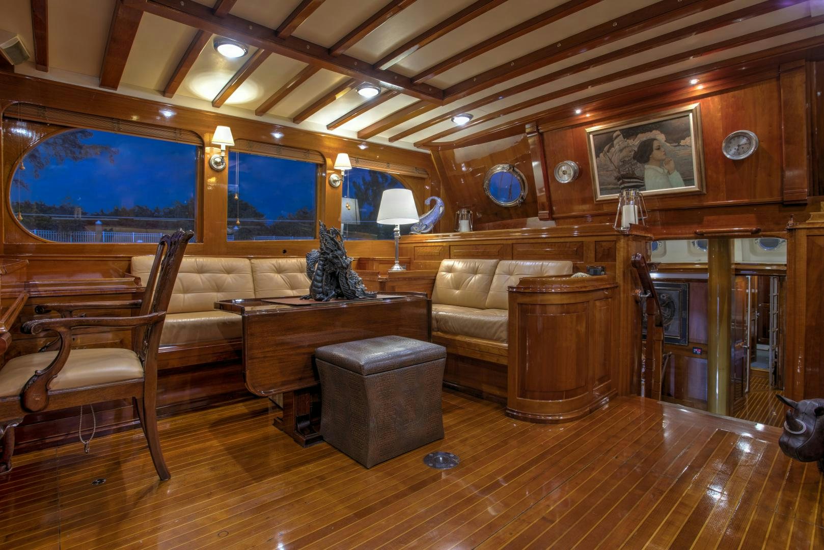a living room with wood floors aboard SEA DIAMOND Yacht for Sale