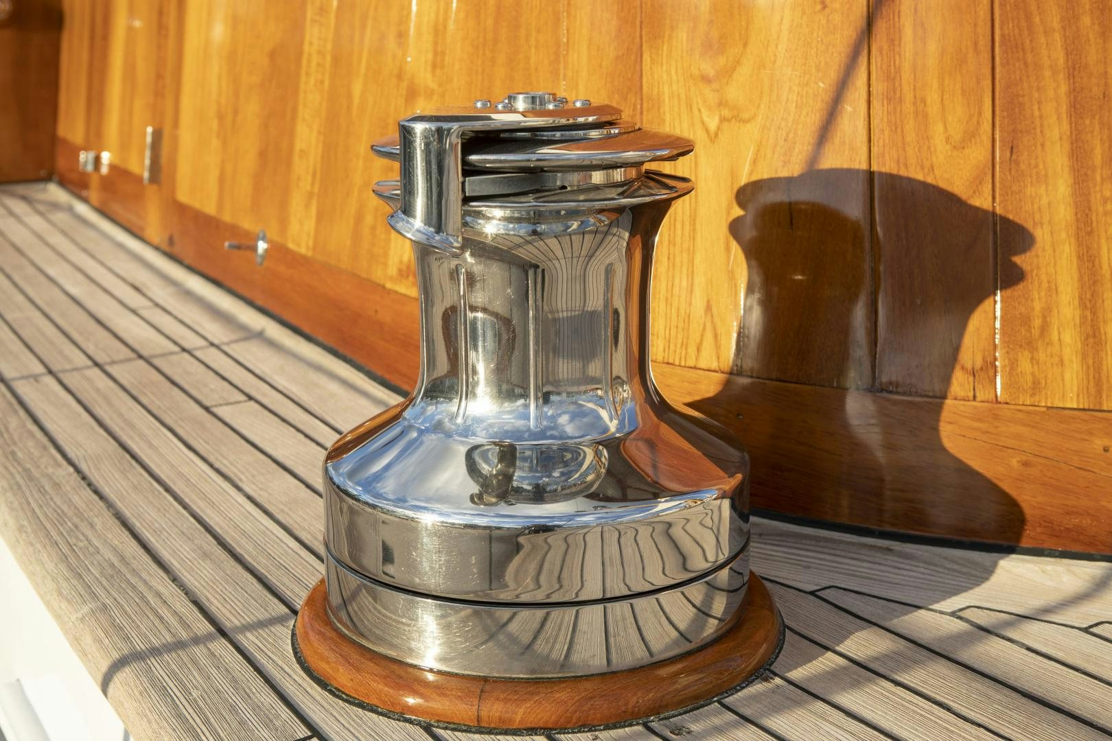 a silver metal object on a wooden surface aboard SEA DIAMOND Yacht for Sale