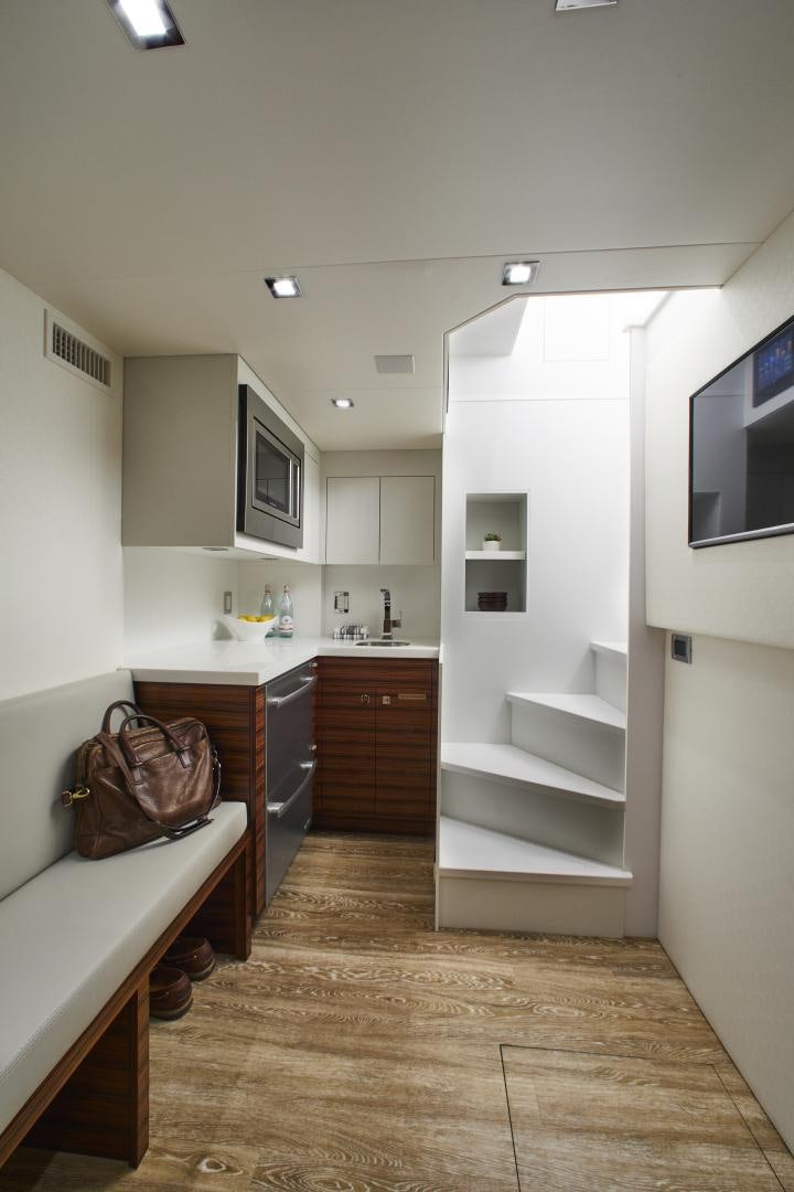 a kitchen with a white shelf aboard 2021 NEW BUILD Yacht for Sale