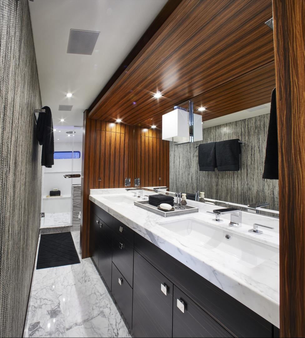 a bathroom with a sink and a mirror aboard 2021 NEW BUILD Yacht for Sale