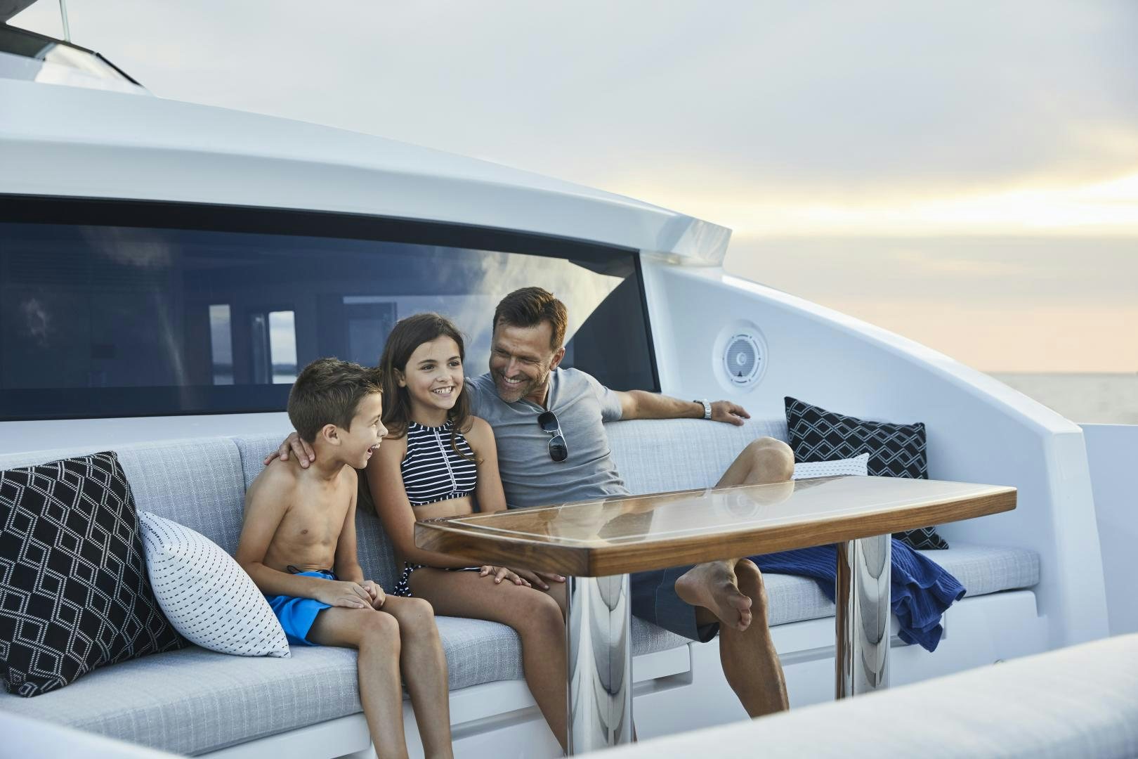 a group of people sitting on a couch aboard 2021 NEW BUILD Yacht for Sale
