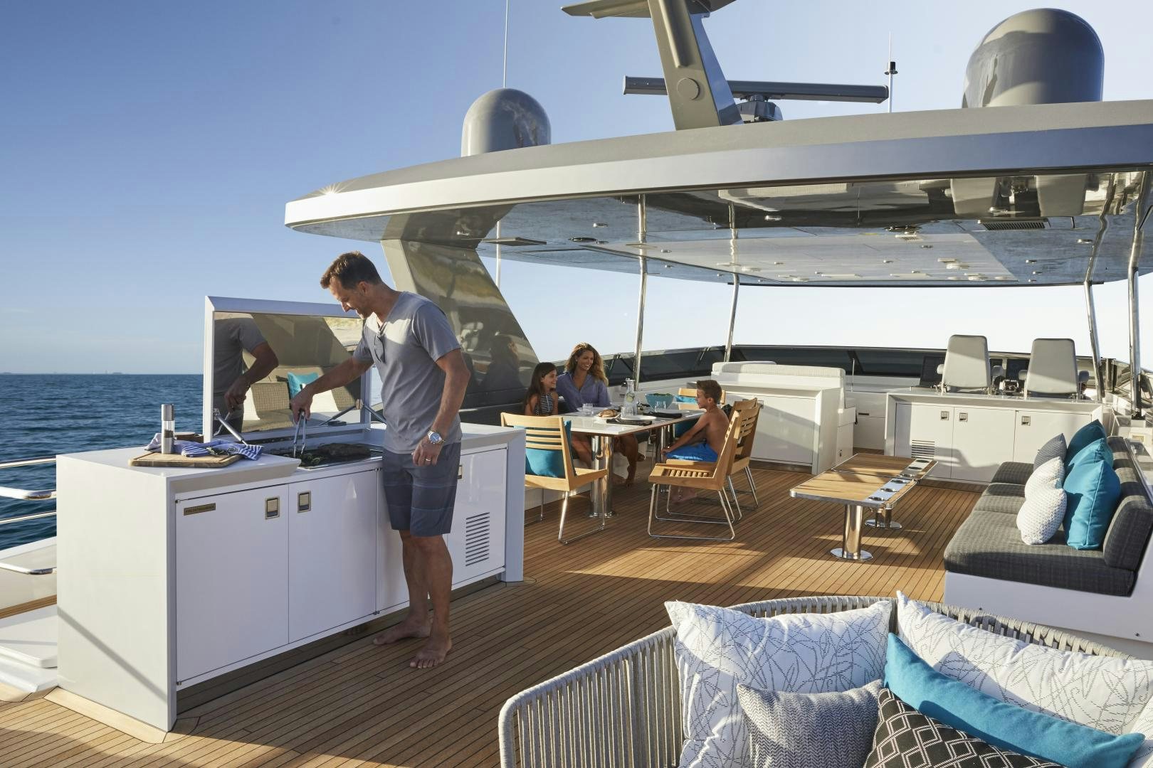 a person standing on a deck of a boat on a boat aboard 2021 NEW BUILD Yacht for Sale
