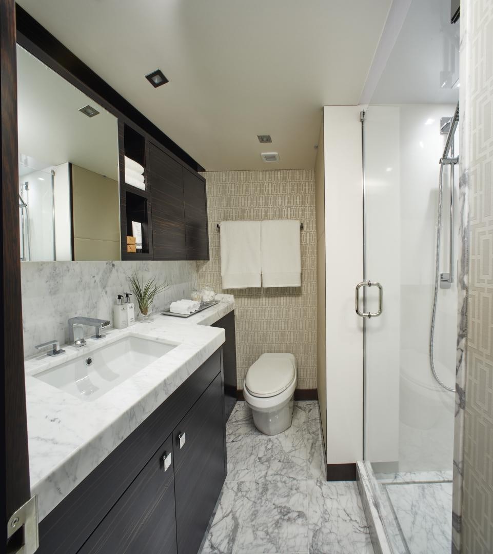 a bathroom with a shower and toilet aboard 2021 NEW BUILD Yacht for Sale