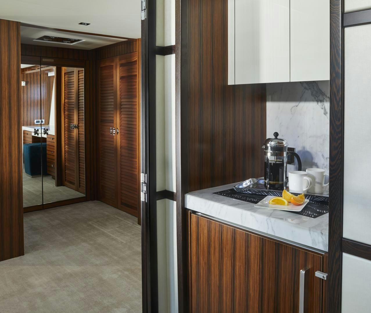 a kitchen with a sink and cabinets aboard 2021 NEW BUILD Yacht for Sale