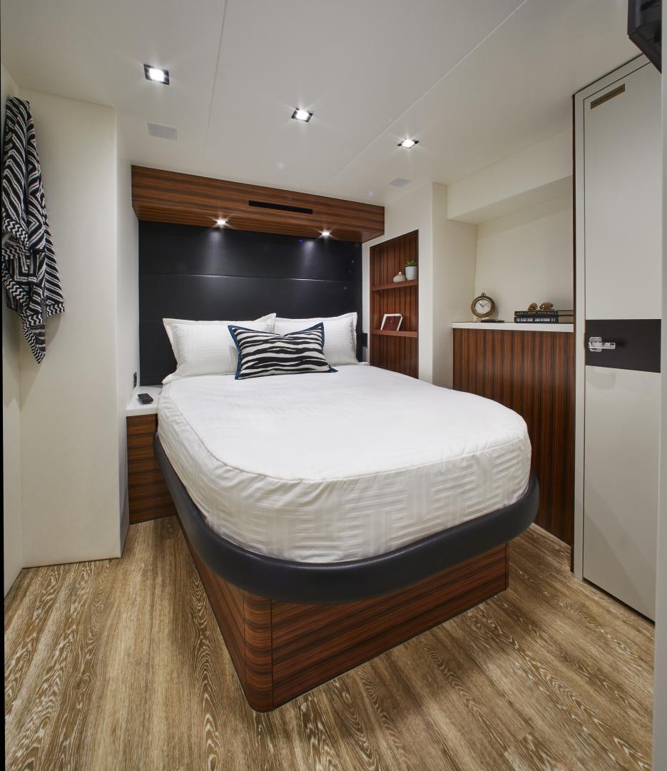 a bed in a room aboard 2021 NEW BUILD Yacht for Sale