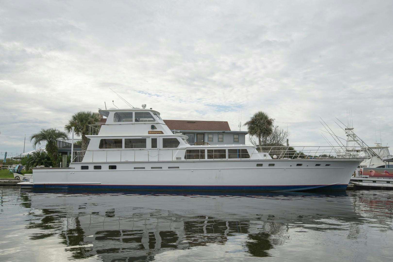 a large white boat in the water aboard HEMINGWAY Yacht for Sale