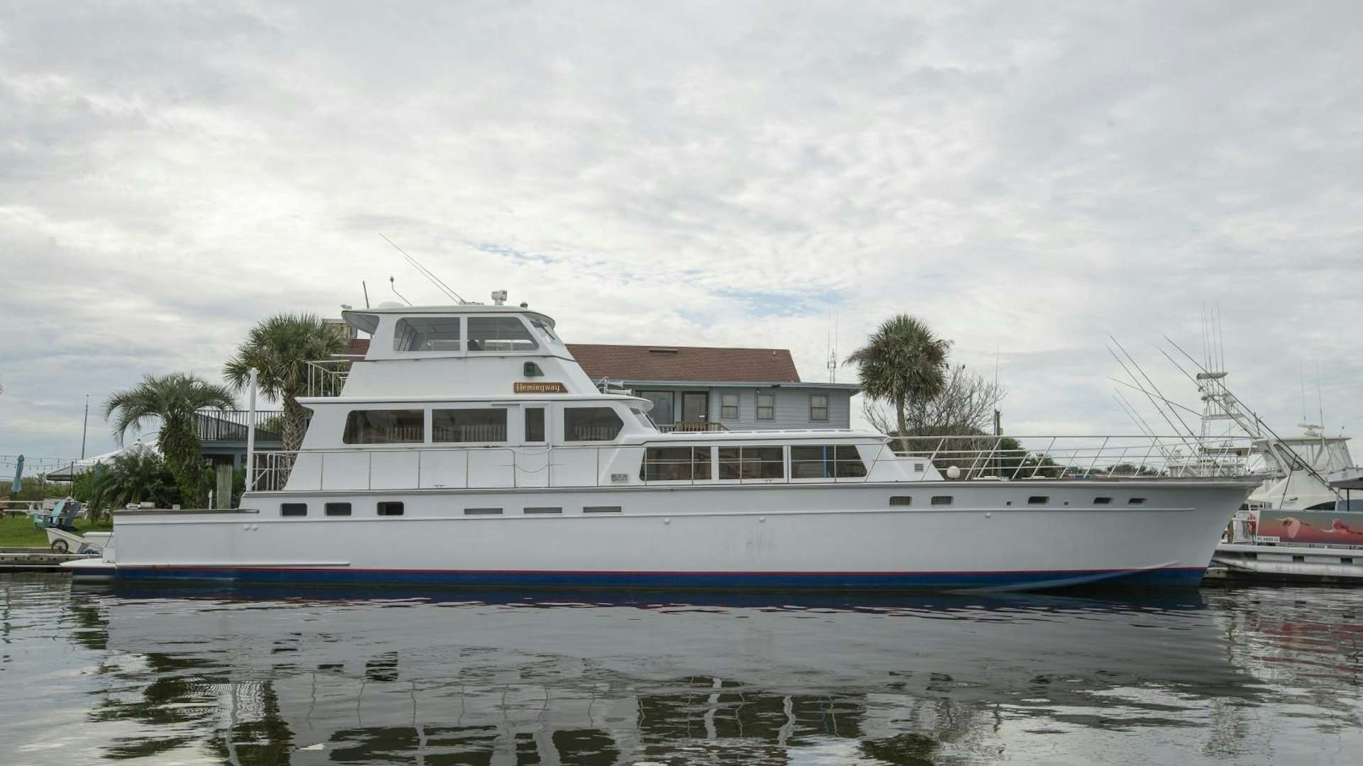 a large white boat in the water aboard HEMINGWAY Yacht for Sale