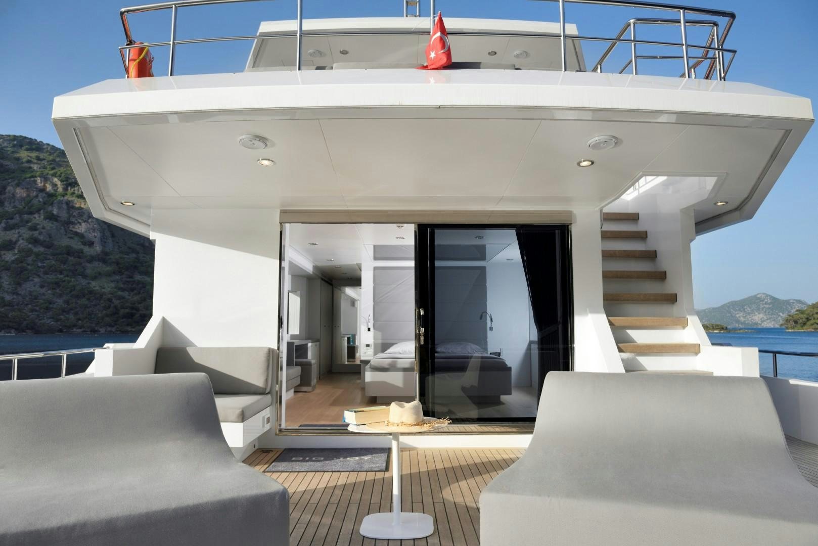 a house with a staircase aboard BIG JOY Yacht for Sale