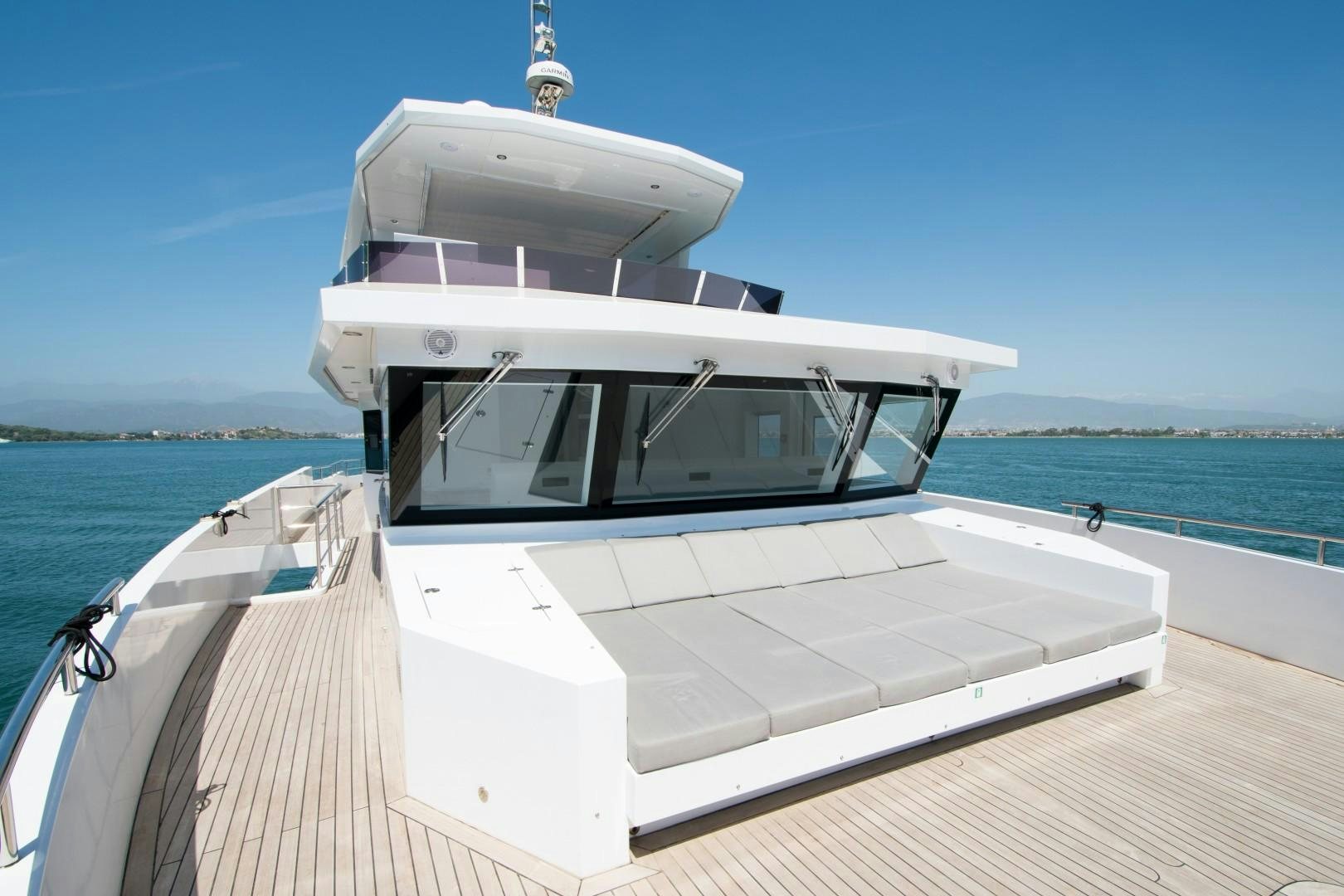 a boat on a dock aboard BIG JOY Yacht for Sale
