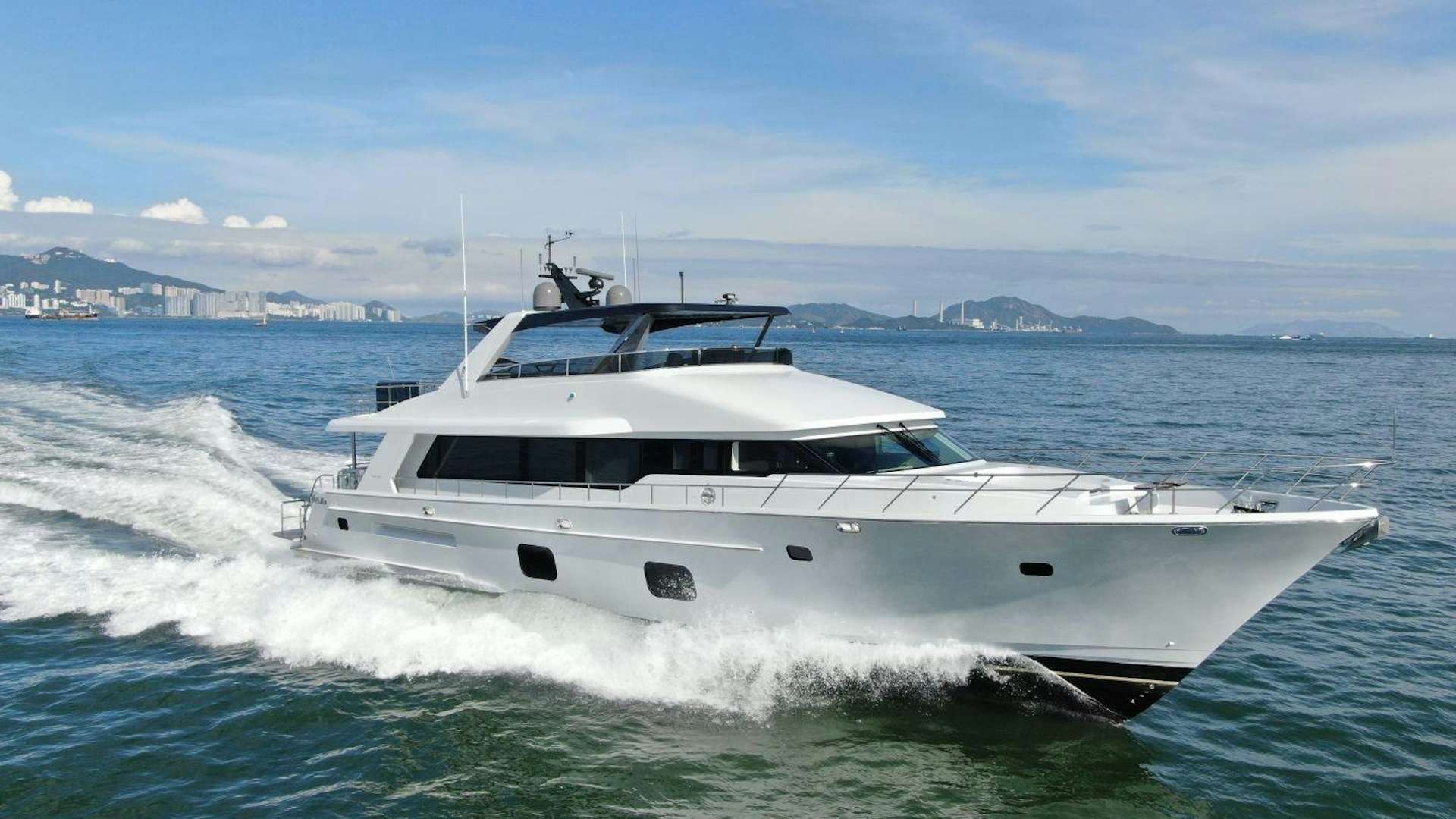 a white yacht on the water aboard CLB88 Yacht for Sale