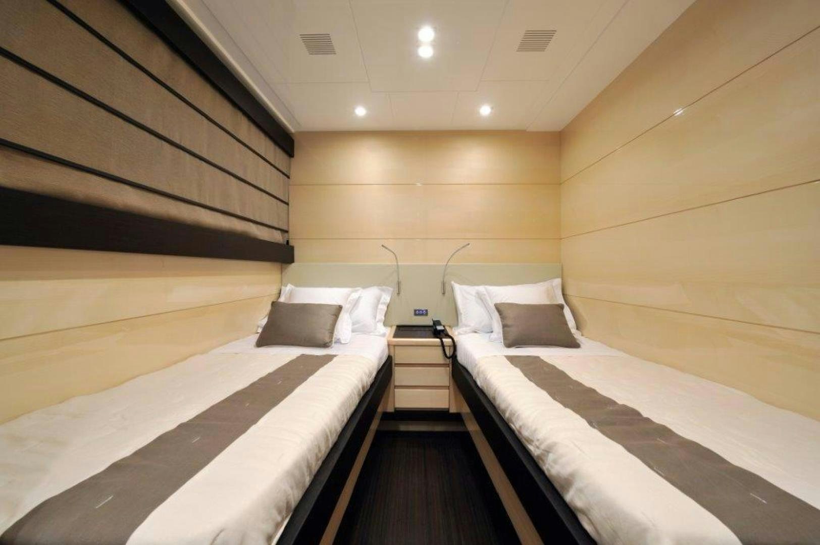 a room with bunk beds aboard ELLISIUM Yacht for Sale