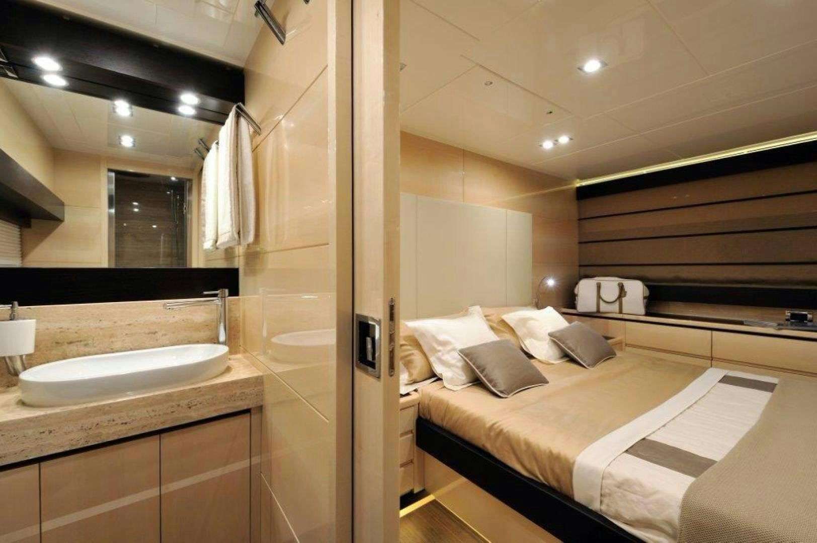 a bathroom with a bed and a sink aboard ELLISIUM Yacht for Sale