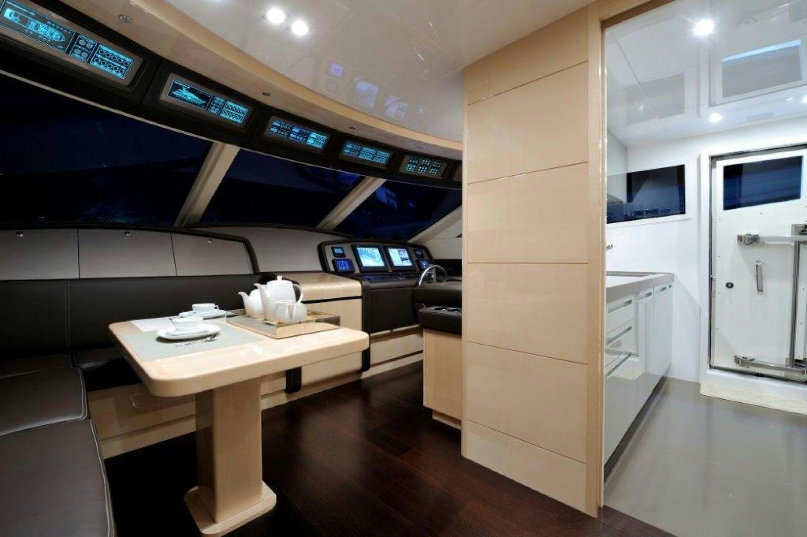 a room with a desk and a computer aboard ELLISIUM Yacht for Sale