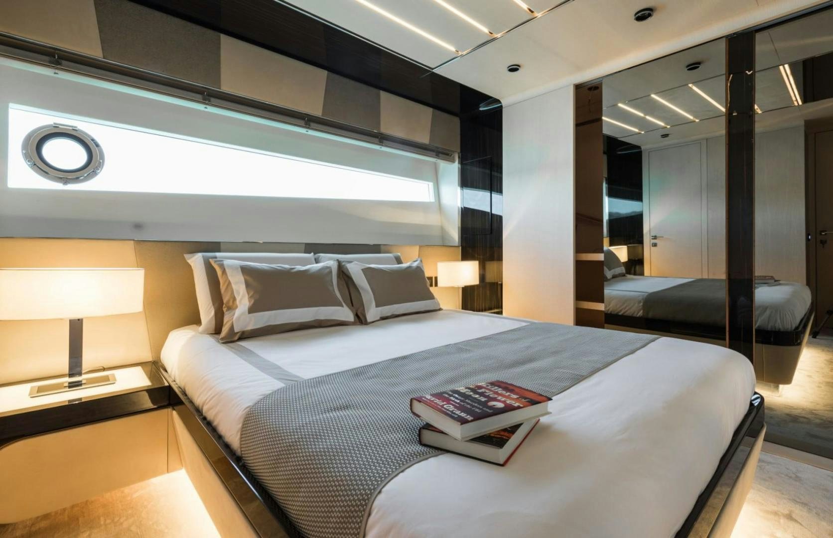 a bed in a room aboard KALLIENTE Yacht for Sale