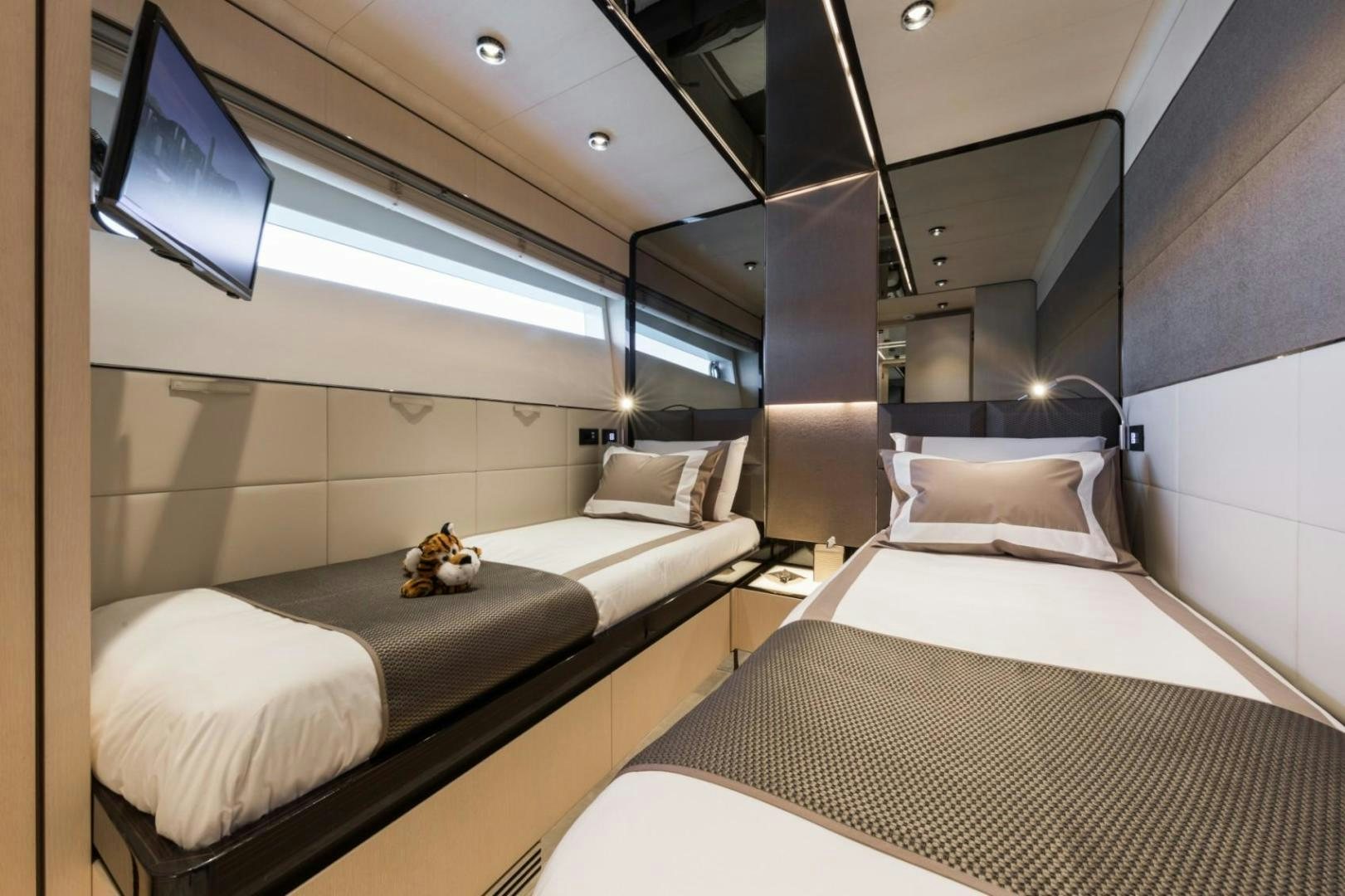 a room with two beds aboard KALLIENTE Yacht for Sale
